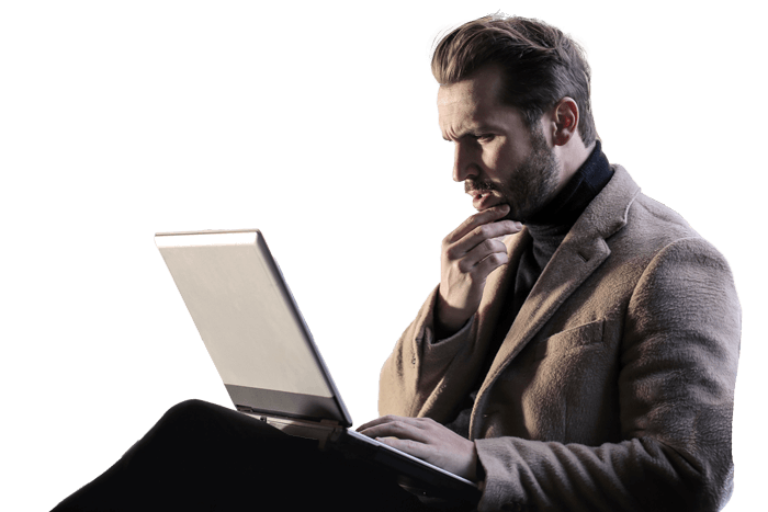 man thinking in front of computer